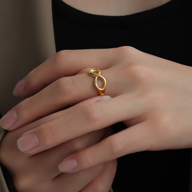 585 gold ring - bicoloured shiny infinity symbol, narrow smooth shoulders |  Jewellery Eshop EU